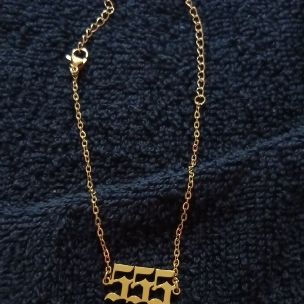 Elegant Gold Necklace with Asian Symbol Pendant